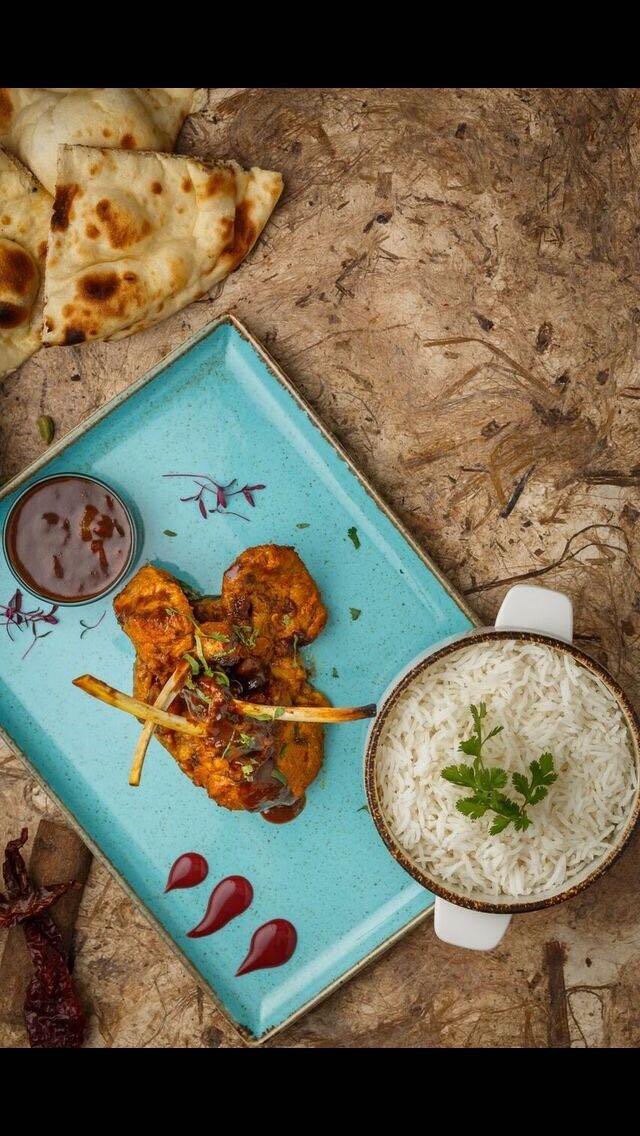 Taj Cuisine
