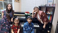 Larissa Timochina (Kids Music Discovery Classes/ Piano & Voice)