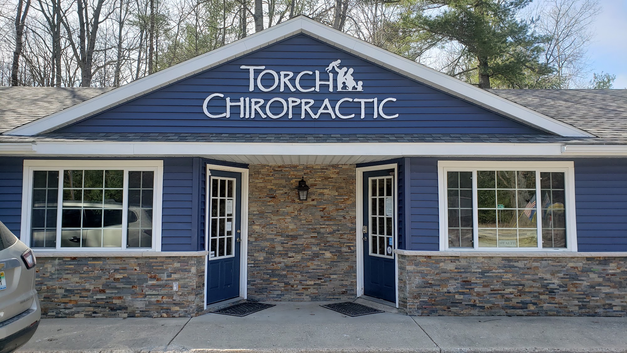 Torch Chiropractic Family Wellness Center 9995 Rapid City Rd NW, Rapid City Michigan 49676