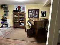 Piano Moving Art & Piano Storage